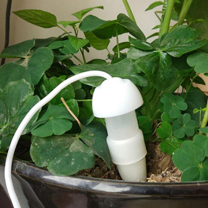 植物自動散水装置植物点滴灌漑水ステーク用庭セラミック自己散水 - Trowel Garden Tools のレビューと価格